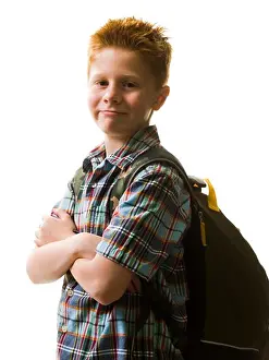 Caucasian Boy Looking At Camera Impressions: Boy with backpack