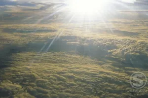 Lens Flare Photography Impressions: Clouds in the sky