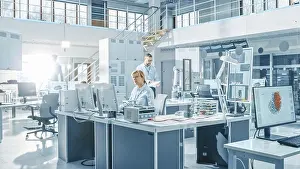 Computer Specialist Impressions: Engineer working on a computer