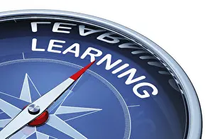 Learning Concept Image Impressions: 3D rendering of an compass with an learning icon