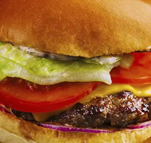 Unhealthy Snack Options Impressions: Appetizing cheeseburger close up background