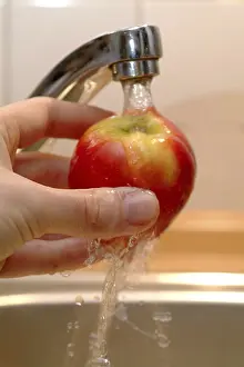 Healthy Dessert Ideas Impressions: An apple being washed