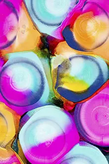 Colorful Design Impressions: An array of vibrant, abstract ink patterns featuring a mixture of bright pink