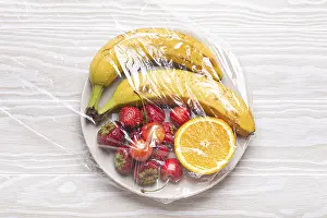 White Table Background Impressions: Assorted different fruit