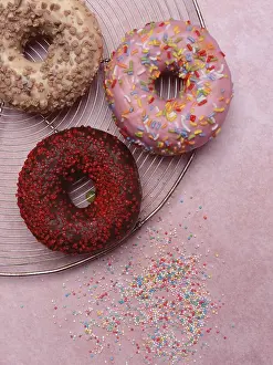 Decorative Food Items Impressions: Assorted donuts with icing