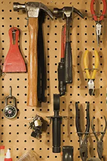 Quebec Canada Studio Shot Impressions: Assorted hand tools that include a small and medium hammer