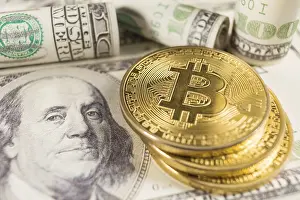 Cryptocurrency Market Trends Impressions: Bitcoin stack and banknotes of one hundred dollar