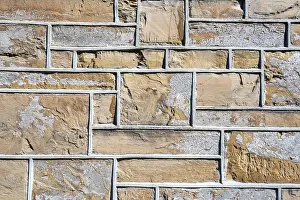 Textured Stone Wall Impressions: Bordered bricks, house facade, background image