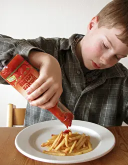 Child Eating Habits Impressions: Boy eats chips