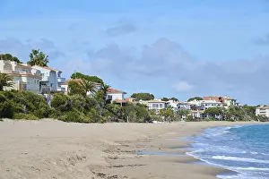 Spanish Coastline Impressions: Breaking waves on a sandy beach