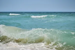 Spanish Coast Impressions: Breaking waves on a sandy beach