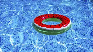 Summer Leisure Activity Impressions: A bright ring-a float, with a watermelon