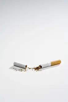 Broken Cigarette Impressions: Broken cigarette split into two, split in half