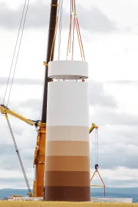 Ecofriendly Renewable Energy Impressions: Building and assembling a construction windmill by crane