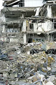 House Demolition Impressions: Building in the process of being torn down, debris