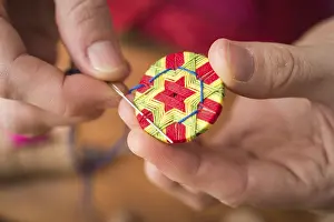 Handicraft Tool Impressions: Button maker stitching and wrapping green