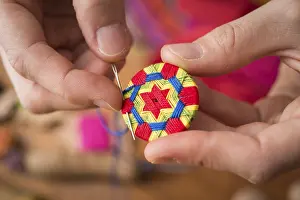 German Handicrafts Impressions: Button maker stitching and wrapping green