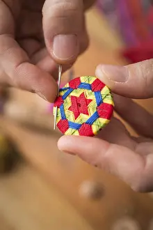 Handicraft Tool Impressions: Button maker stitching and wrapping green