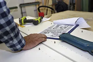 Handcrafted Goods Production Process Impressions: Carpenter at work in his carpentry workshop