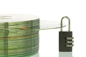 Data Theft Prevention Impressions: CD stack with a CD and a padlock