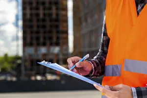 Close Up Construction Impressions: Close up construction engineer writing