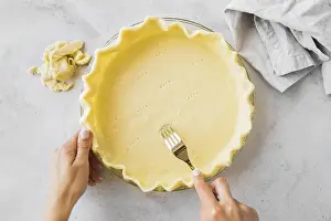 Pastry Detail View Impressions: Close up hands preparing pie