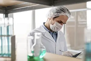Close Up Scientist Impressions: Close up scientist taking notes