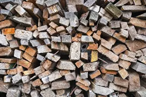 Deserted Woodpile Impressions: Close up of a stack of timber with rusty nails