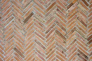 Brick Wall Pattern Impressions: Close-up of a brick wall with a zigzag pattern