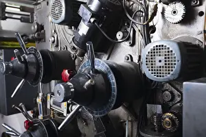 Metal Manufacturing Process Impressions: Close-up on complex detail of typography machine