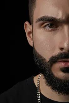 Close Up Portrait Impressions: A close-up dramatic portrait of a young serious guy
