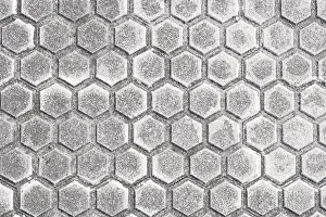 Urban Architecture Details Impressions: Close-up of a modern pavement featuring hexagonal tile patterns
