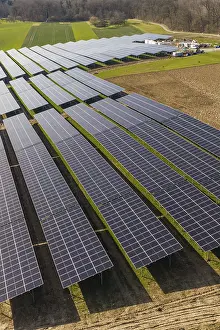 Green Field Landscape Impressions: Close-up of structured solar modules over green fields