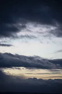 Deserted Evening Sky Impressions: Cloud hole at sunset, bizarre clouds