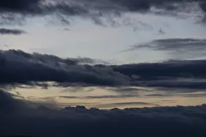 Deserted Evening Atmosphere Impressions: Cloud hole at sunset, bizarre clouds