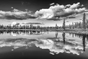 Lapland Landscape Impressions: Cloud reflection in a forest lake