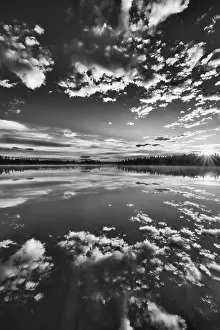 Scandinavian Water Reflections Impressions: Cloud reflection in a forest lake