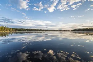 Lapland Landscape Photography Impressions: Cloud reflection in a forest lake