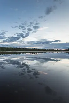 Scandinavian Nature Scene Impressions: Cloud reflection in a forest lake