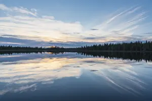 Scandinavian Nature Images Impressions: Cloud reflection in a forest lake