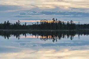 Cloudy Sky Over A Lake Impressions: Cloud reflection in a forest lake