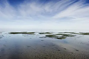 Central Europe Waterfront Landscape Impressions: Cloud reflection in the mudflats