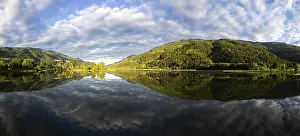 Cloudy Lake Reflections Impressions: Clouds are reflected in the lake