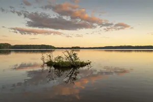 Scandinavian Nature Scenes Impressions: Clouds reflected on the water surface