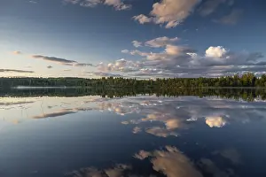 Scandinavian Evening Mood Impressions: Clouds reflected on the water surface
