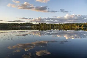 Water Surface Reflection Impressions: Clouds reflected on the water surface