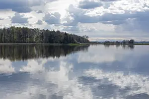 Schleswig Holstein Waterfront Impressions: Clouds reflected in the water, trees