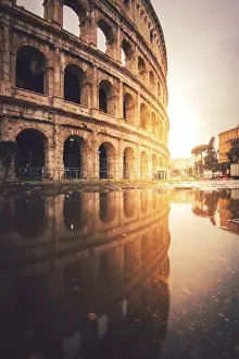 Ancient Roman Civilization Impressions: The Colosseum with reflection, puddle