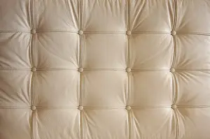 Dramatic Lighting Impressions: Comfortable buttoned leather pattern with dramatic lighting