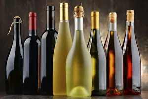 Alcoholic Beverage Arrangement Impressions: Composition with assorted bottles of wine
